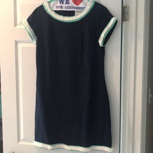 Navy dress with fringe.